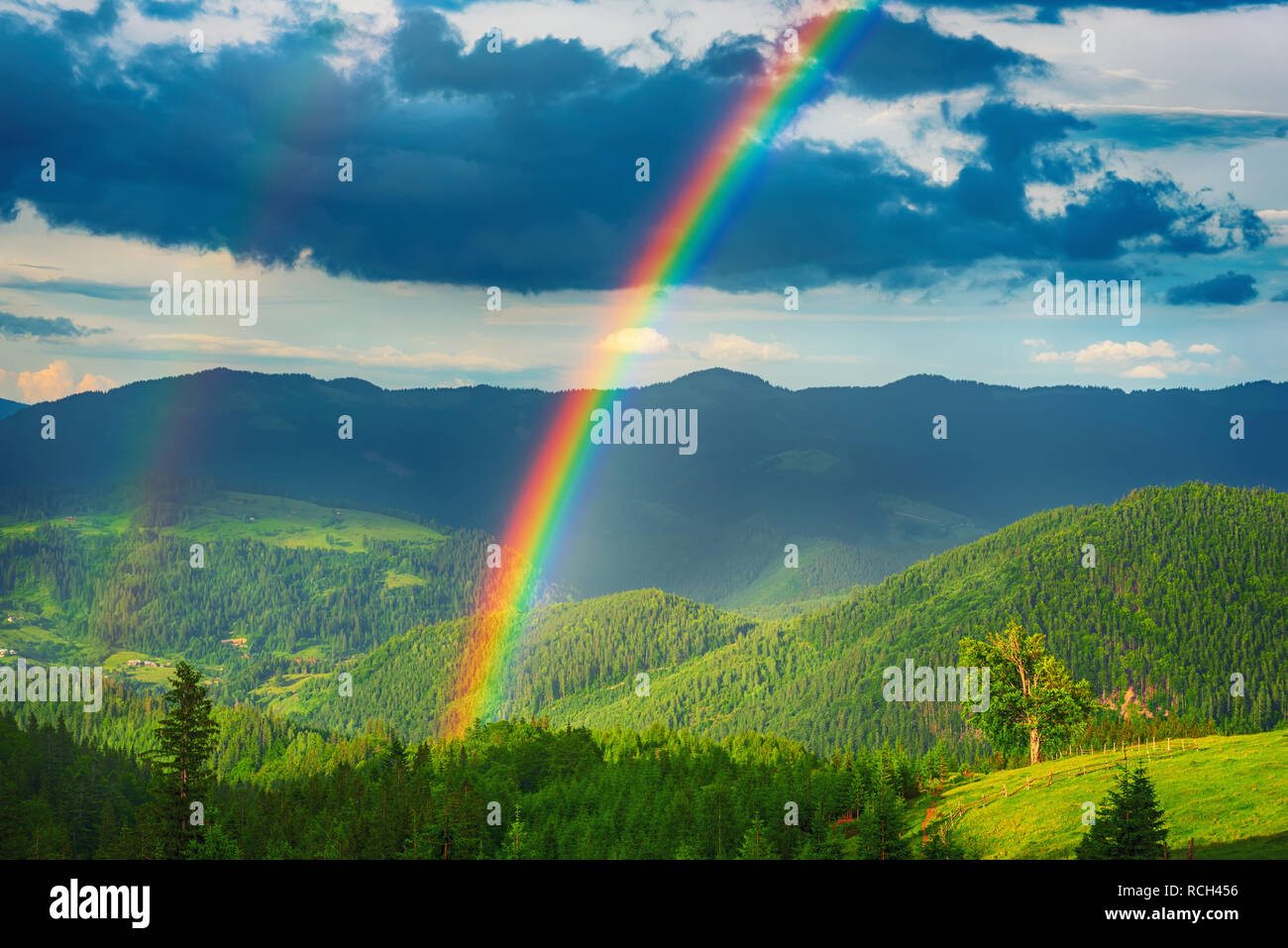 Mountains and rainbow Stock Photo