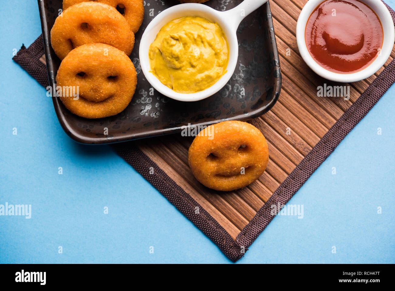 Crunchy potato smiling face snacks hi-res stock photography and images ...
