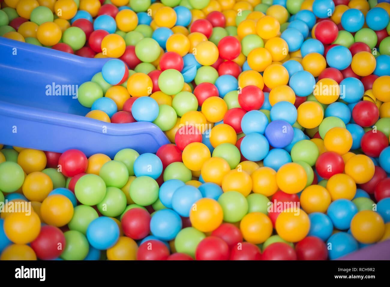 Toddler slide and colorful playing balls in the Children's playground