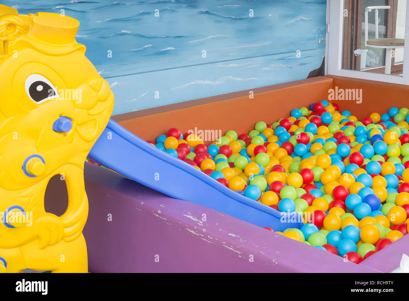 Toddler slide and colorful playing balls in the Children's playground