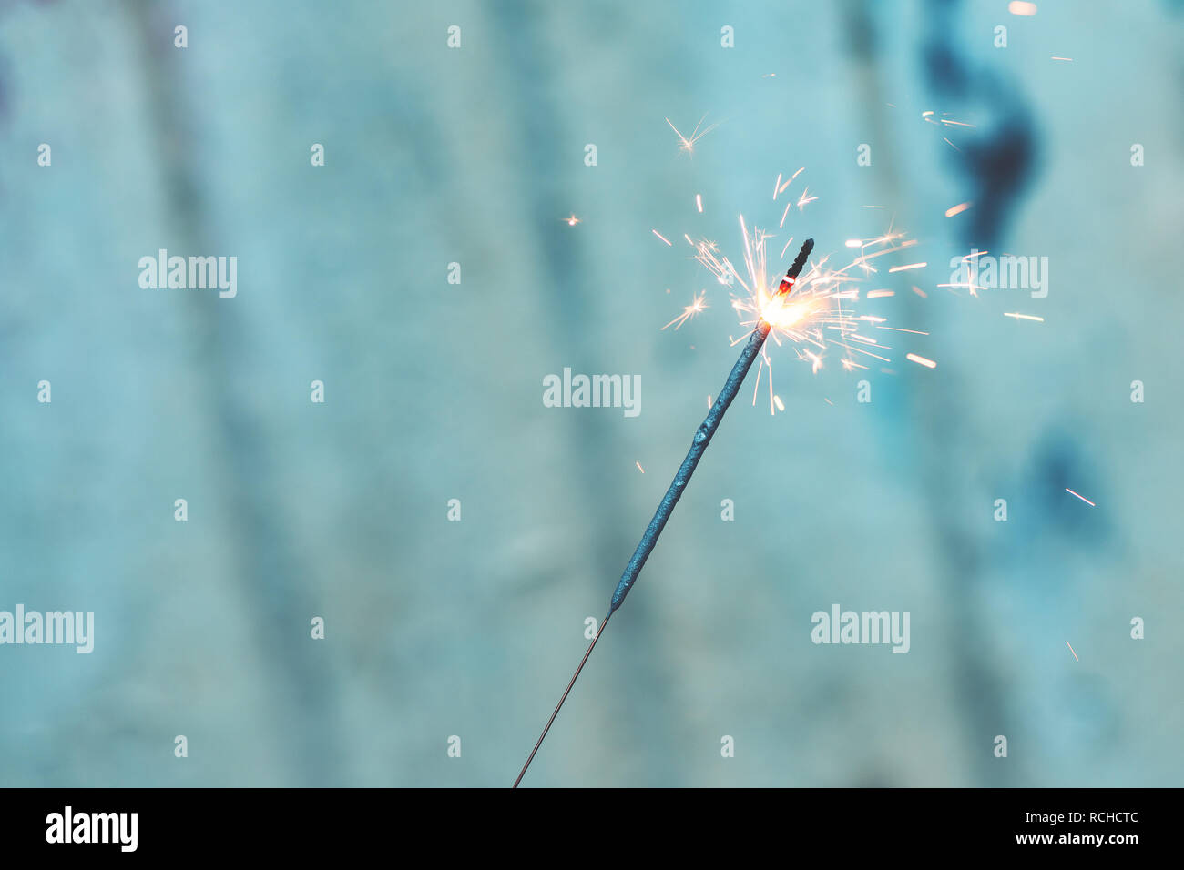 Sparkler burning, close up with copy space Stock Photo