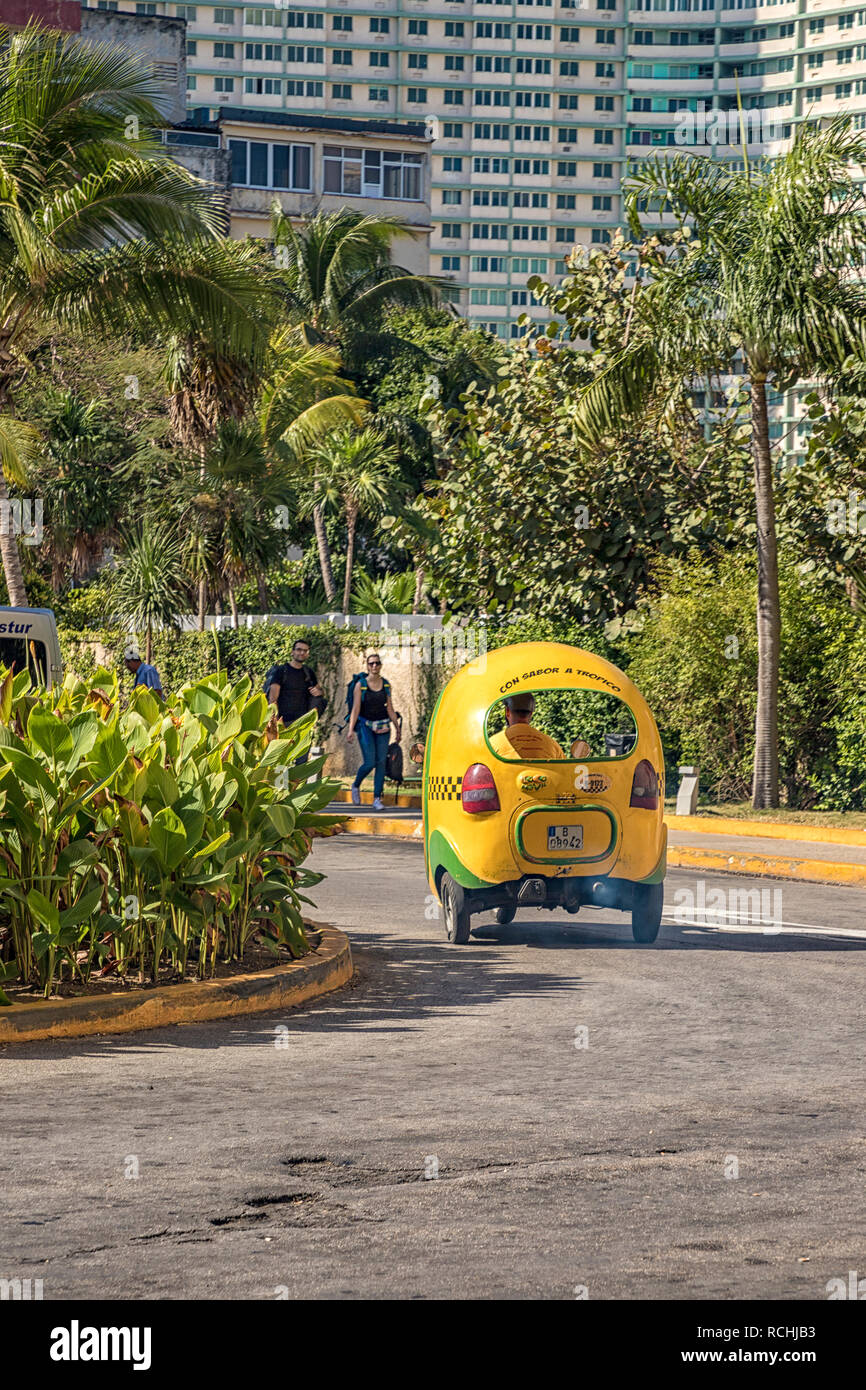 HAVANA, CUBA - December 08.2018: Typical Cuban motorbike taxis are known as Coco taxi in Havana, Cuba. Stock Photo