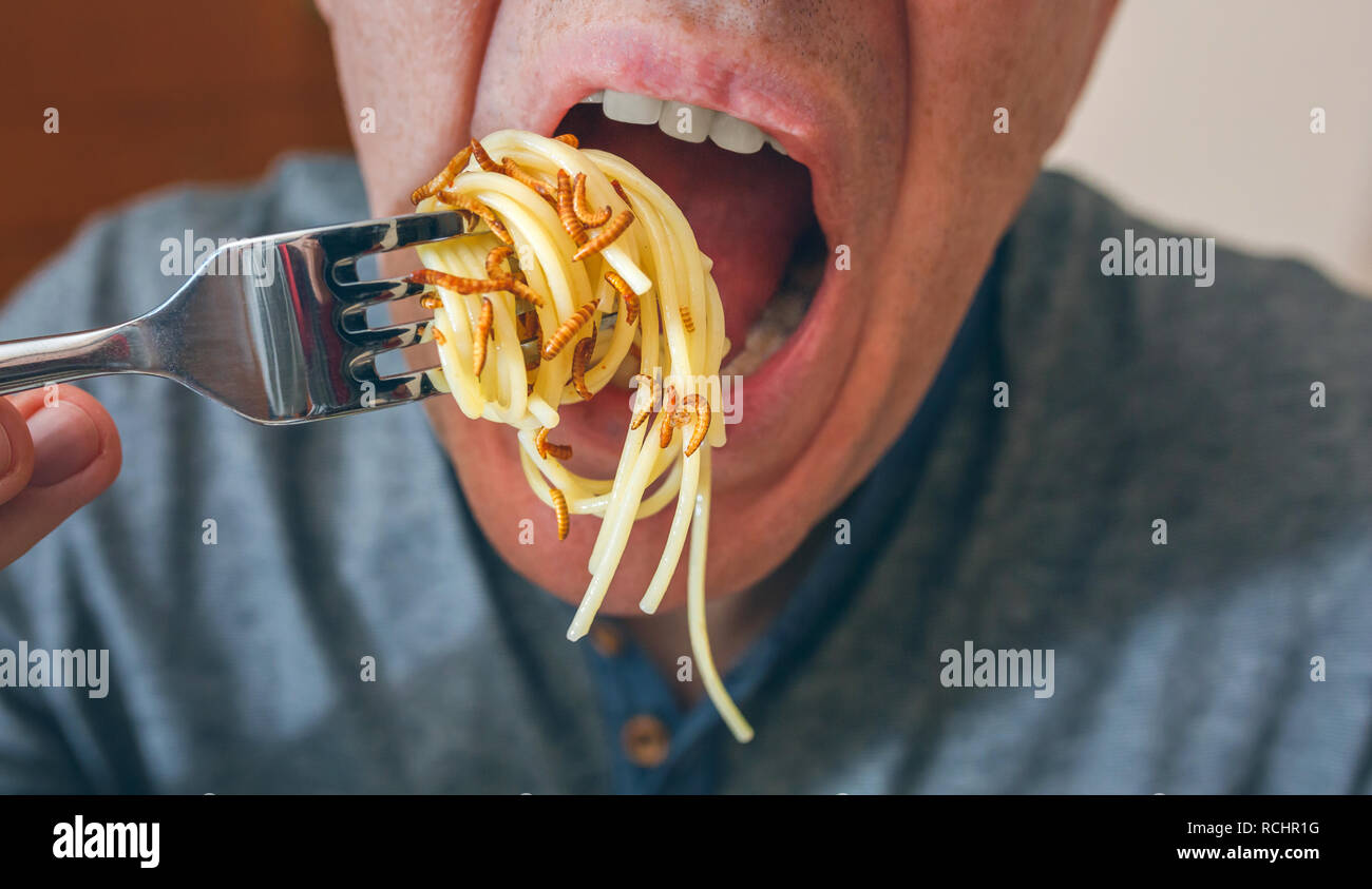 Man eating bug hi-res stock photography and images - Alamy