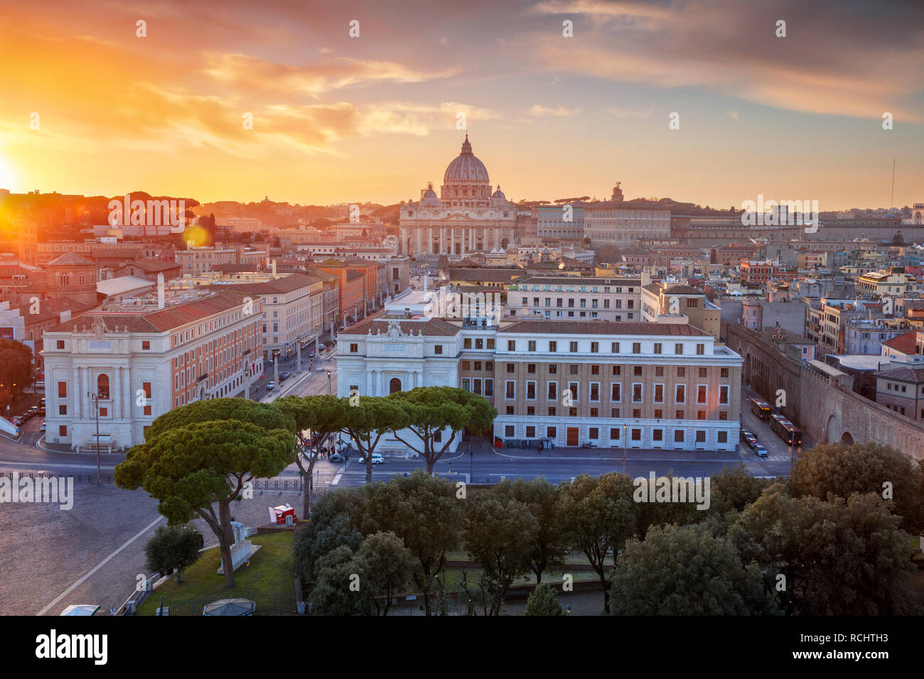 Rome, Vatican City. Aerial cityscape image of Vatican City with the Saint Peter Basilica, Rome, Italy during beautiful sunset. Stock Photo
