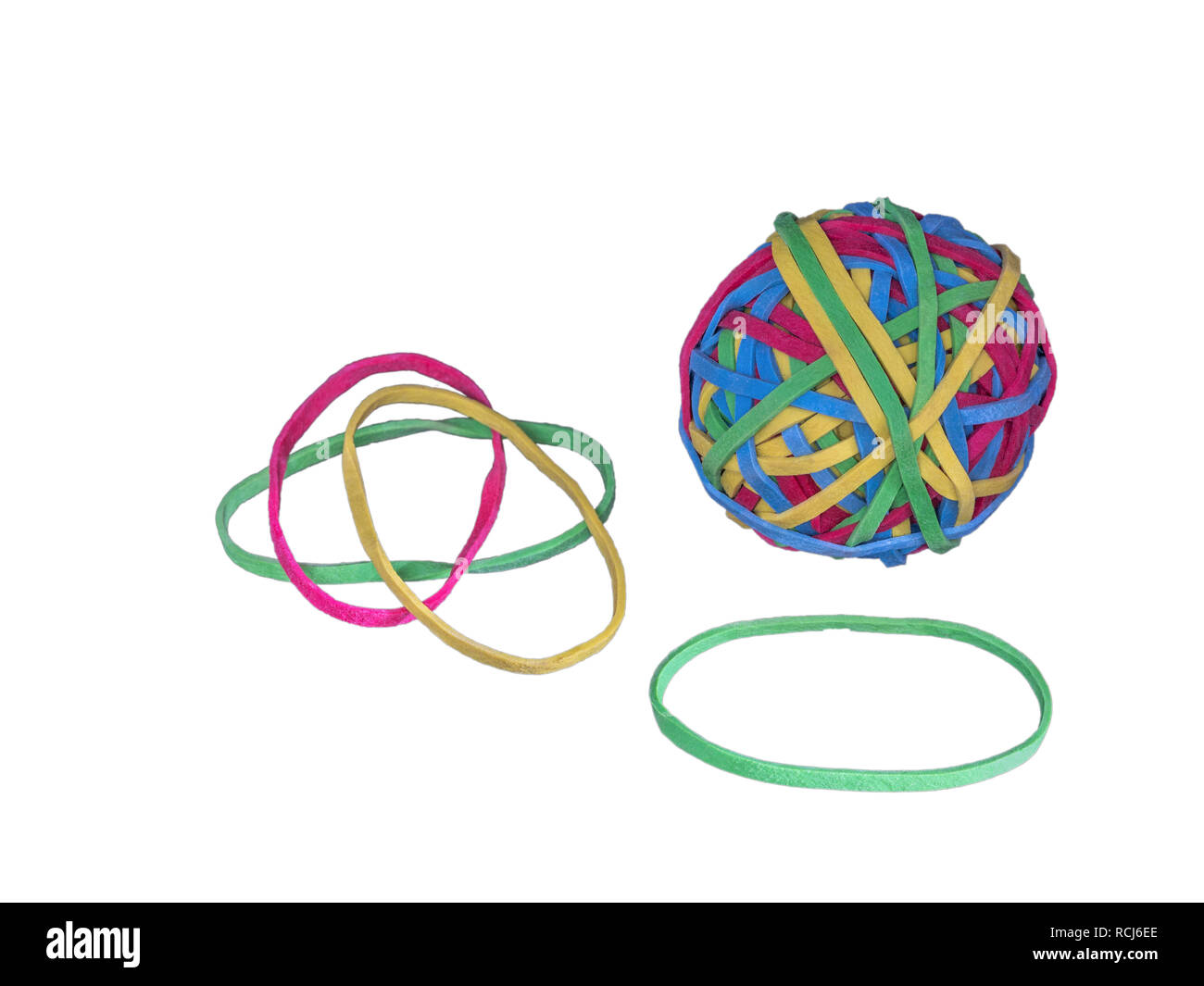 Ball of rubber bands and single rubber bands, white background Stock