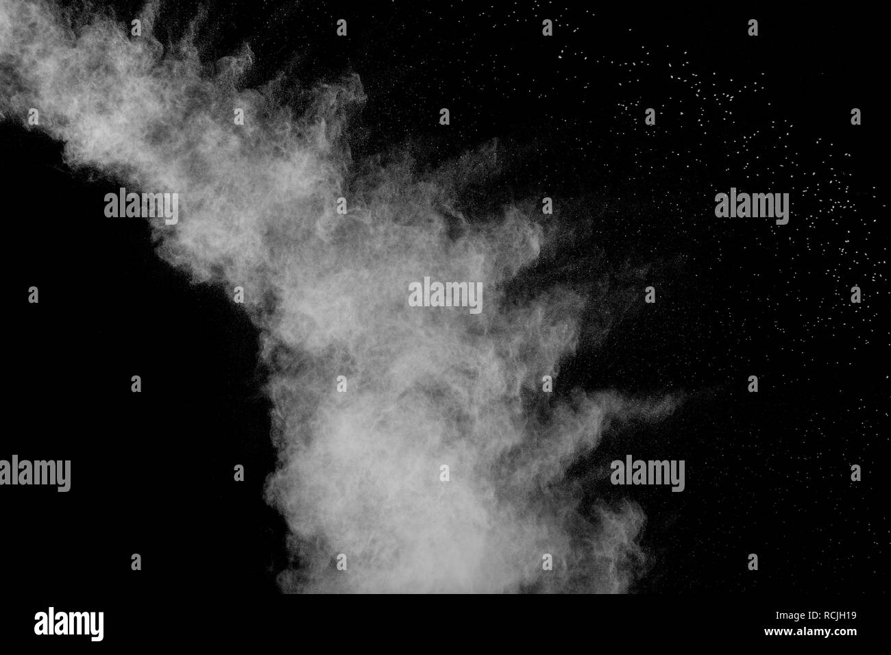 Bizarre forms of white powder explosion cloud against black background
