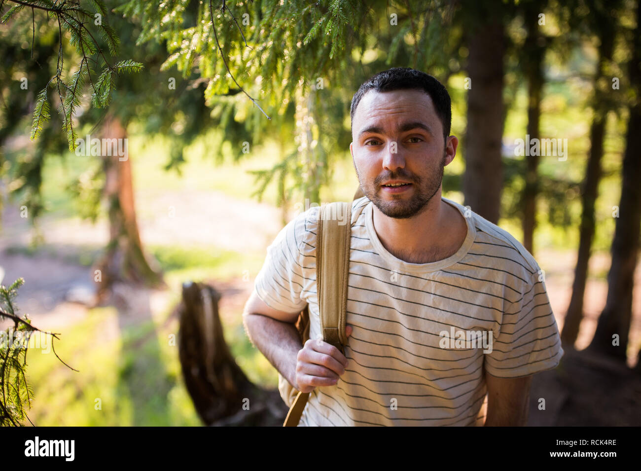Man walking backpack male hiking hi-res stock photography and images ...