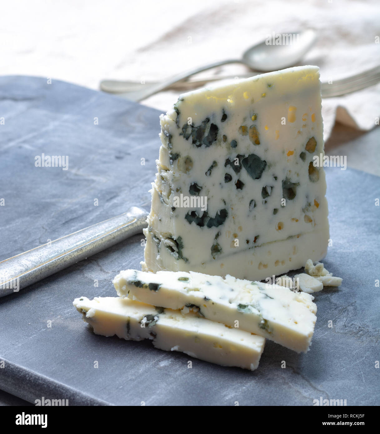 Piece of French blue cheese Roquefort, made from sheep milk in caves of