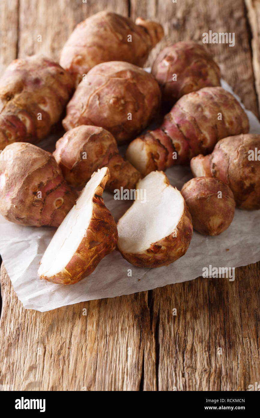 Raw Organic Jerusalem Artichoke Sunchokes Ready to Cook. vertical Stock