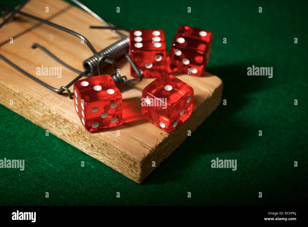 Red dice mousetrap gambling trap hires stock photography and images