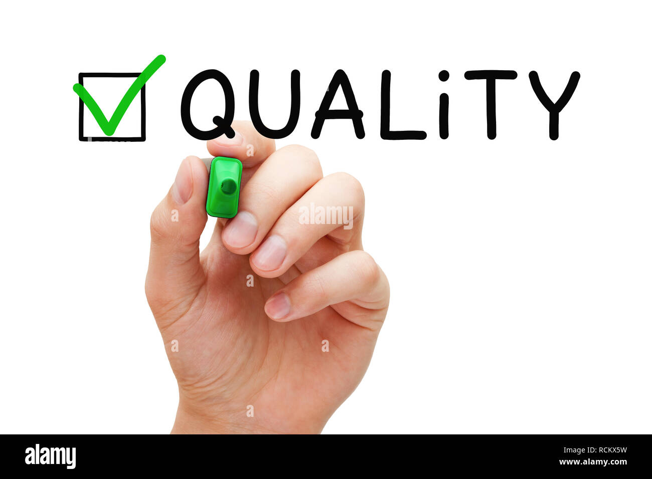 Hand putting check mark on Quality with green marker on transparent wipe board isolated on white. Stock Photo