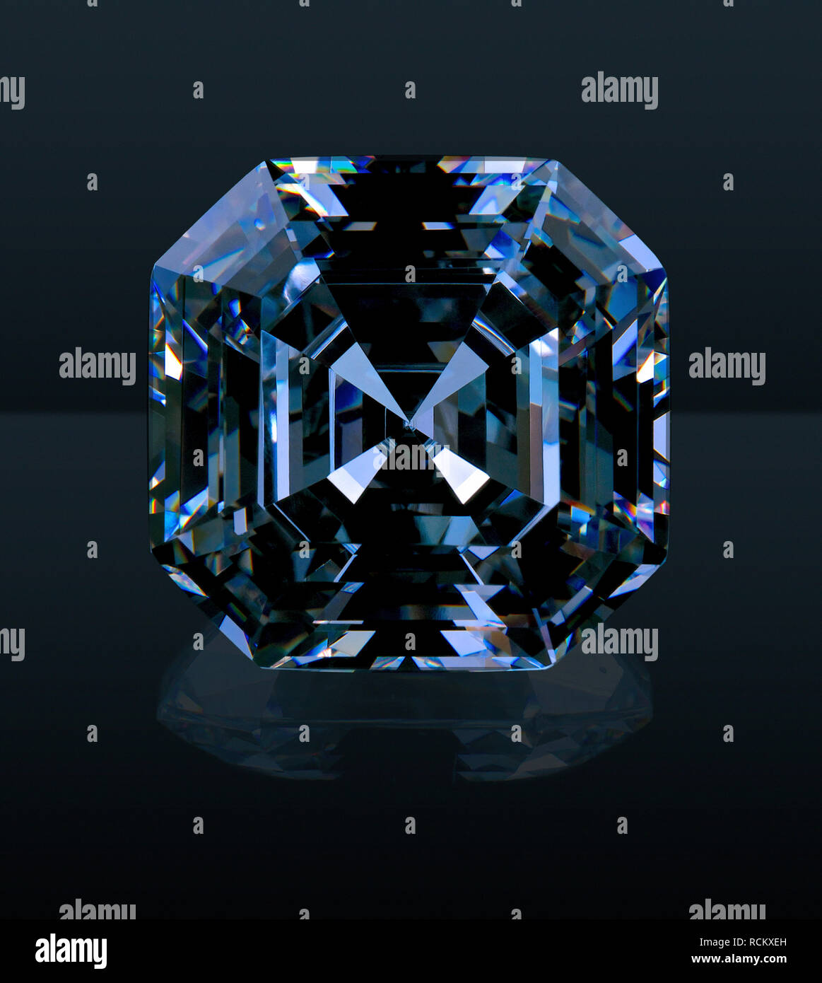 Blue square shaped precious gemstone, close up, black background Stock Photo