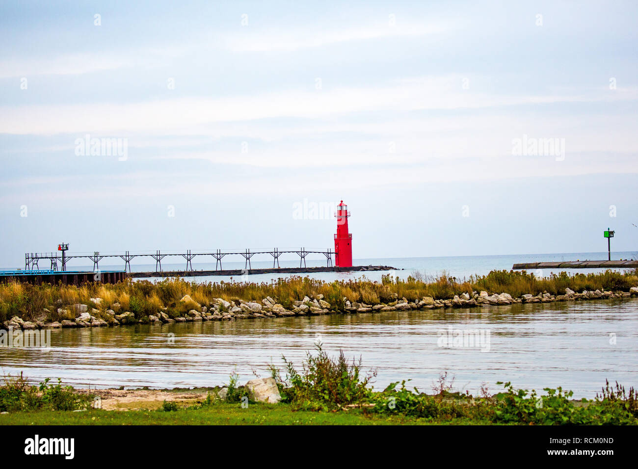 Algoma Harbor and Lighthouse during autumn in Algoma Wisconsin Stock Photo