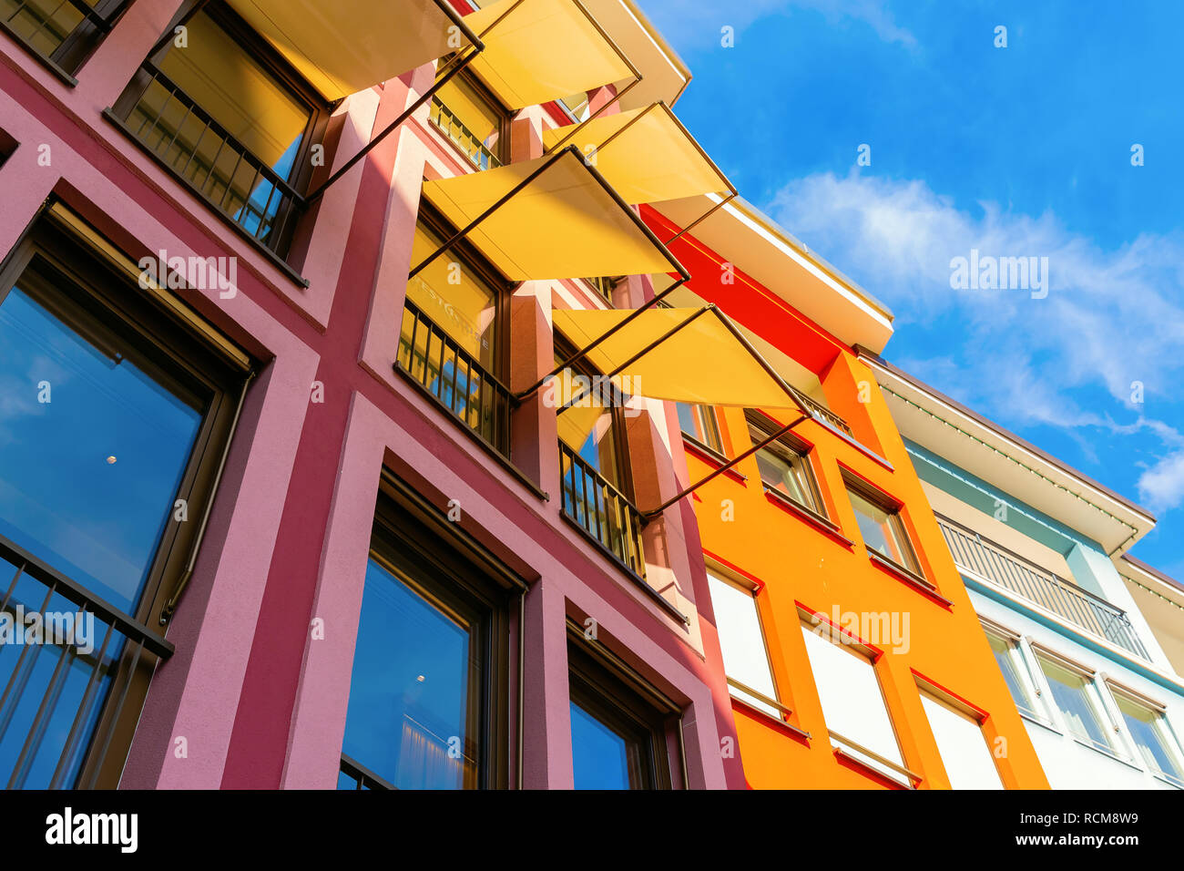 picture of colorful house facades with awnings Stock Photo