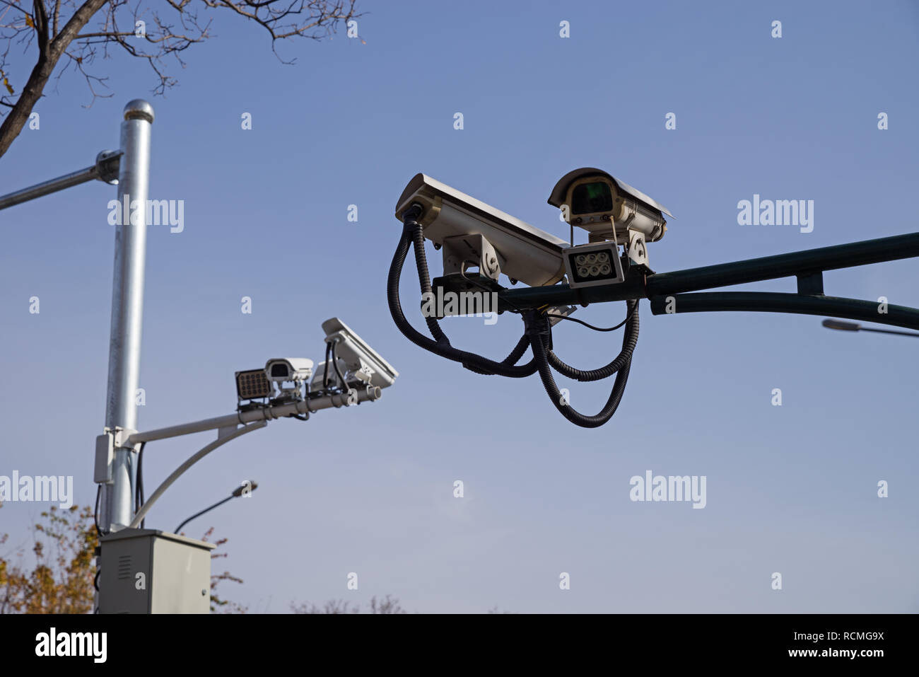 Chinese security video cameras on a street in Beijing Stock Photo