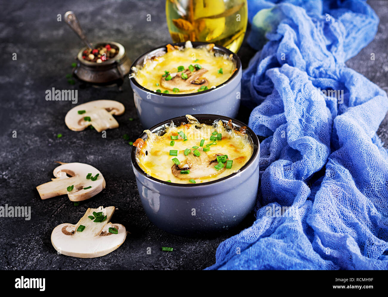 Baked Mushroom Julienne With Chicken And Cheese In Pots Stock Photo Alamy