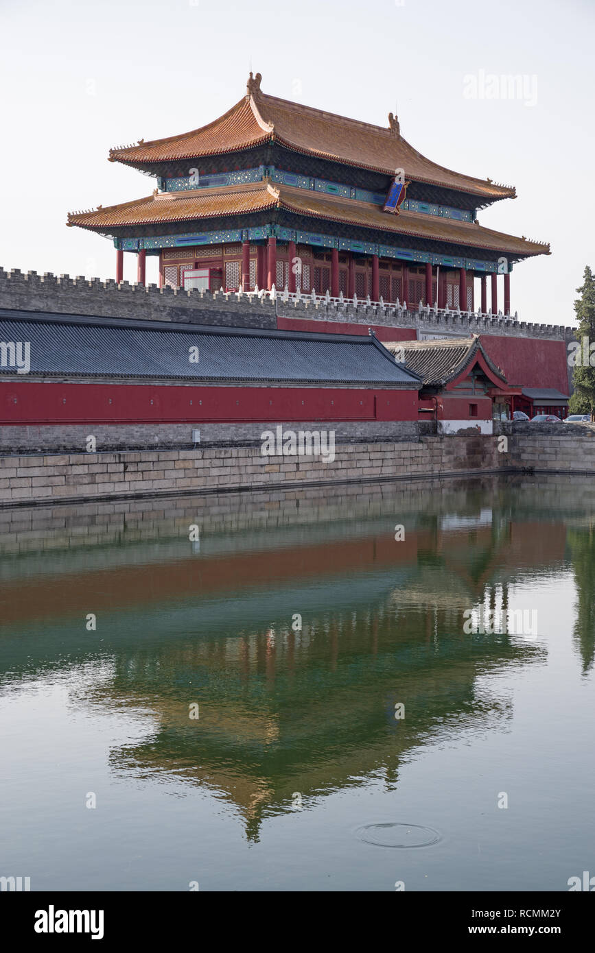 Forbidden City gate building in Beijing reflected in moat Stock Photo