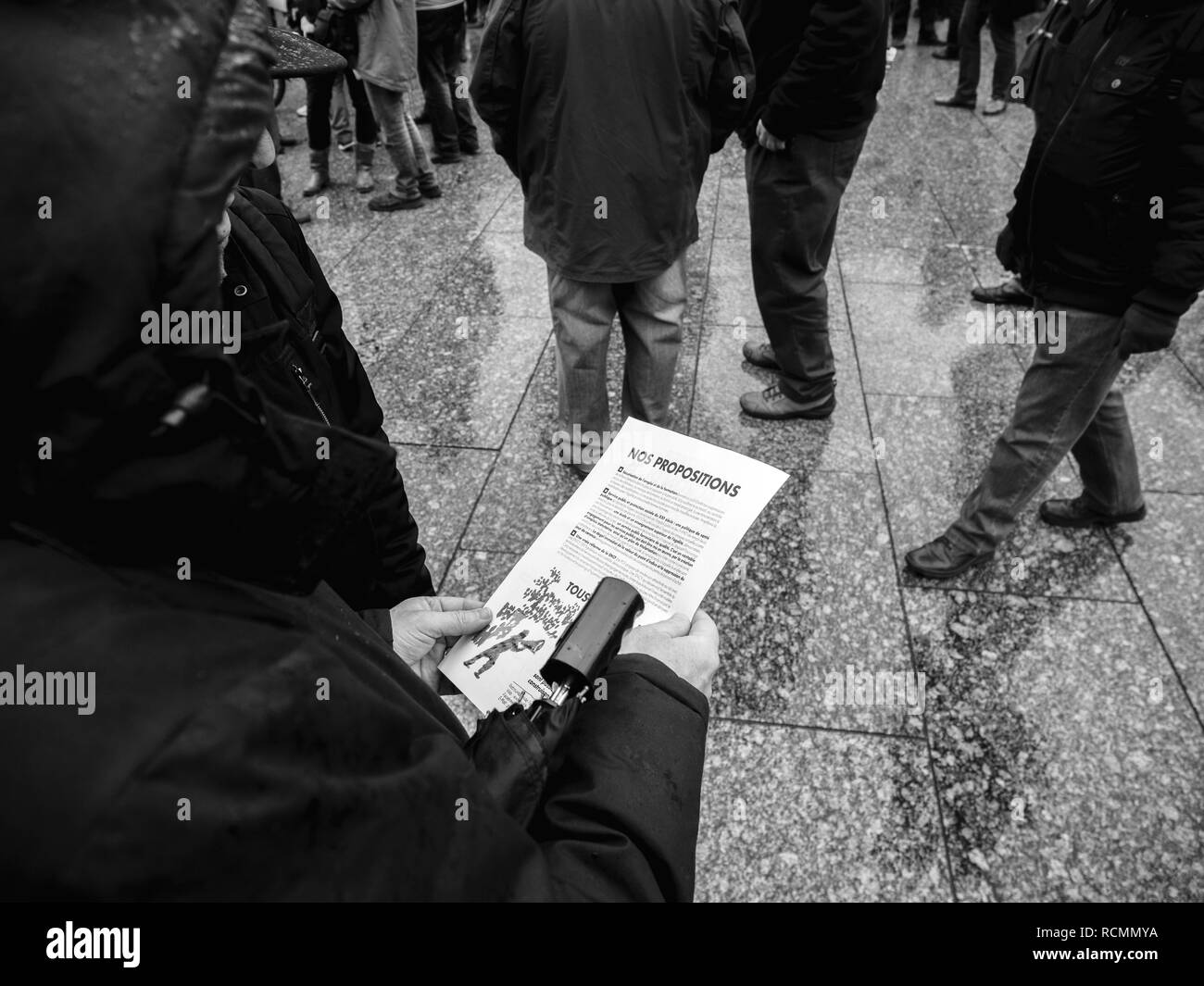 STRASBOURG, FRANCE  - MAR 22, 2018: People at demonstration protest against Macron French government string of reforms, mutiple trade unions have called public workers to strike - black and white  Stock Photo