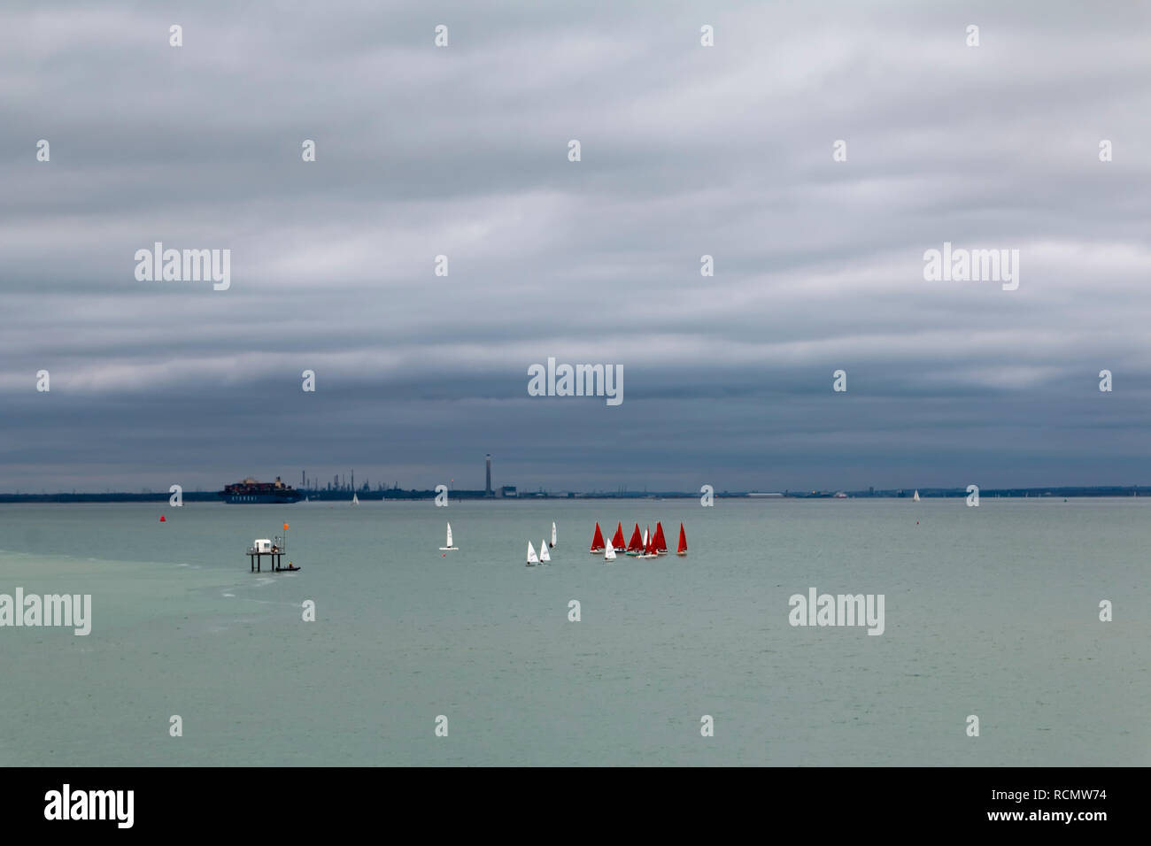 Sail boats, on The Solent, looking towards Portsmouth Stock Photo