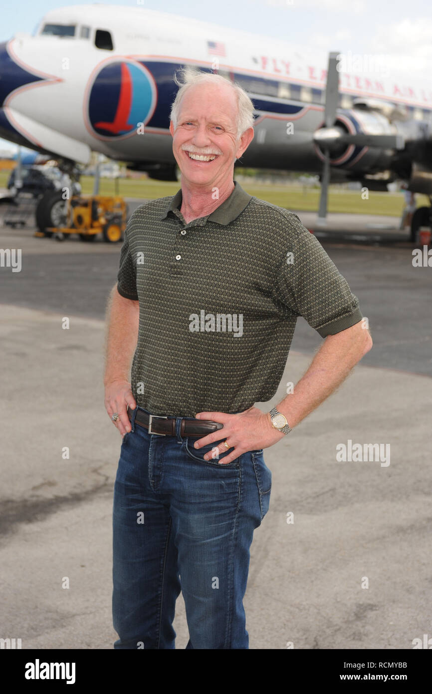 MIAMI, FL - NOVEMBER 17: Captain 'Sully' Sullenberger and Co-pilot Jeff  Skiles pose with the Historical 1958 DC7 for a benefit hosted by Historical  Flight Foundation. Chesley Burnett "Sully" Sullenberger, III (born