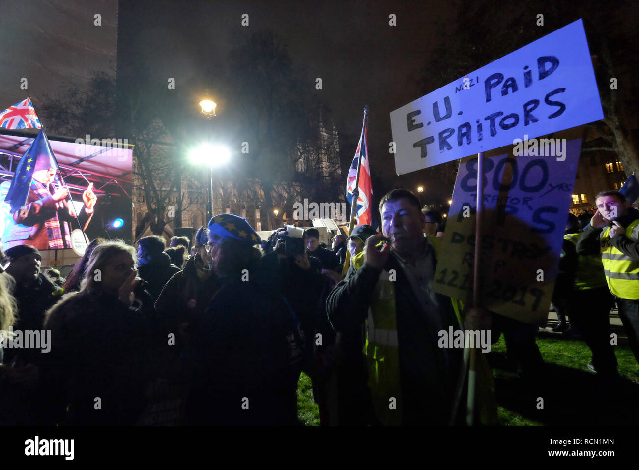 London, UK. 15th Jan 2019. Leave and Remain supporters as well as politicians, media and religious doomsayers gather outside Parliamnet Credit: Rachel Megawhat/Alamy Live News Stock Photo