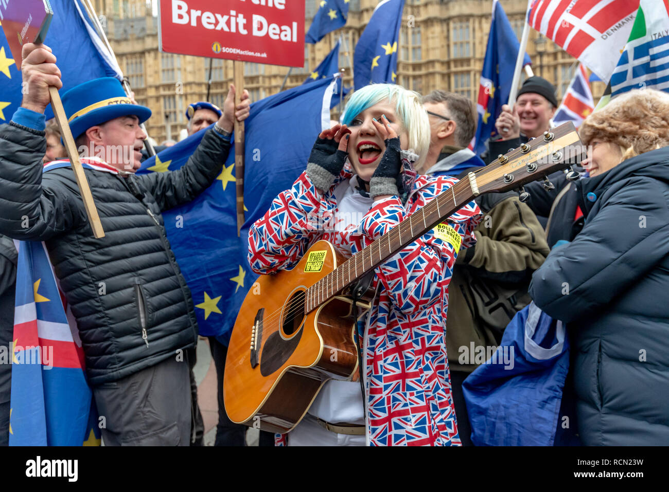London Uk 15th January 19 Supporters Gather Around Eu Supergirl Madeleina Kay Alba White Wolf As Yellow Jacketed Protesters Try To Shout Her Down As He Sings In Praise Of Europe Groups Against