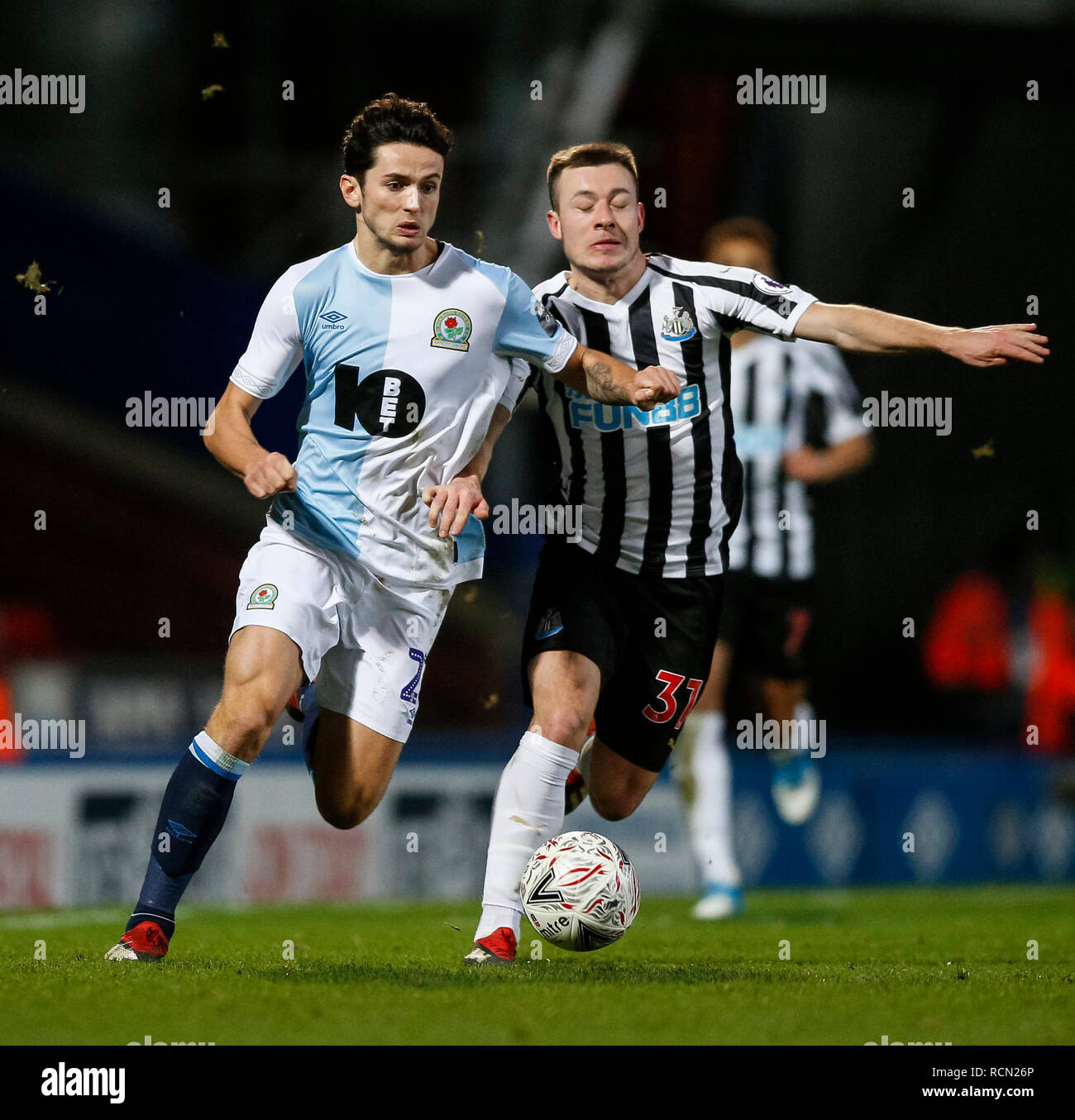 Blackburn, Lancashire, UK. 15th Jan 2019. Lewis Travis of Blackburn Rovers and Callum Roberts of Newcastle United during the FA Cup Third Round replay between Blackburn Rovers and Newcastle United at Ewood Park on January 15th 2019 in Blackburn, England. (Photo by Daniel Chesterton/phcimages.com) Credit: PHC Images/Alamy Live News Stock Photo