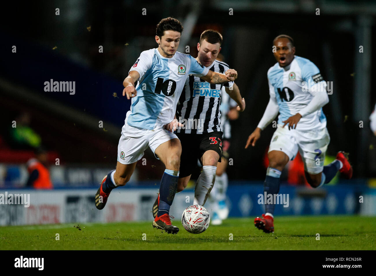 Blackburn, Lancashire, UK. 15th Jan 2019. Lewis Travis of Blackburn Rovers and Callum Roberts of Newcastle United during the FA Cup Third Round replay between Blackburn Rovers and Newcastle United at Ewood Park on January 15th 2019 in Blackburn, England. (Photo by Daniel Chesterton/phcimages.com) Credit: PHC Images/Alamy Live News Stock Photo