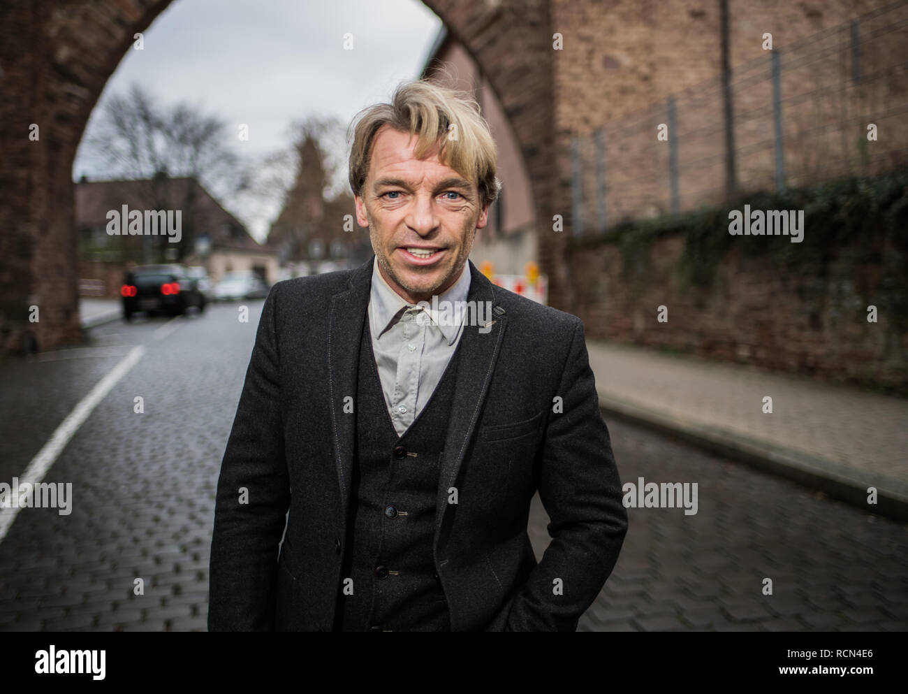 Worms, Germany. 12th Jan, 2019. André Eisermann, actor, stands in the Nibelungen city at the historical city wall. André Eisermann from Worms became famous through his roles at the Nibelungen Festival and in the movies 'Kaspar Hauser' and 'Schlafes Bruder'. In mid-January, the actor from Goethe's 'Die Leiden des jungen Werther' recites in the cathedral city. (to dpa 'Hollywood on the Rhine: Eisermann makes literature - and thinks of the cinema' from 16.01.2019) Credit: Andreas Arnold/dpa/Alamy Live News Stock Photo