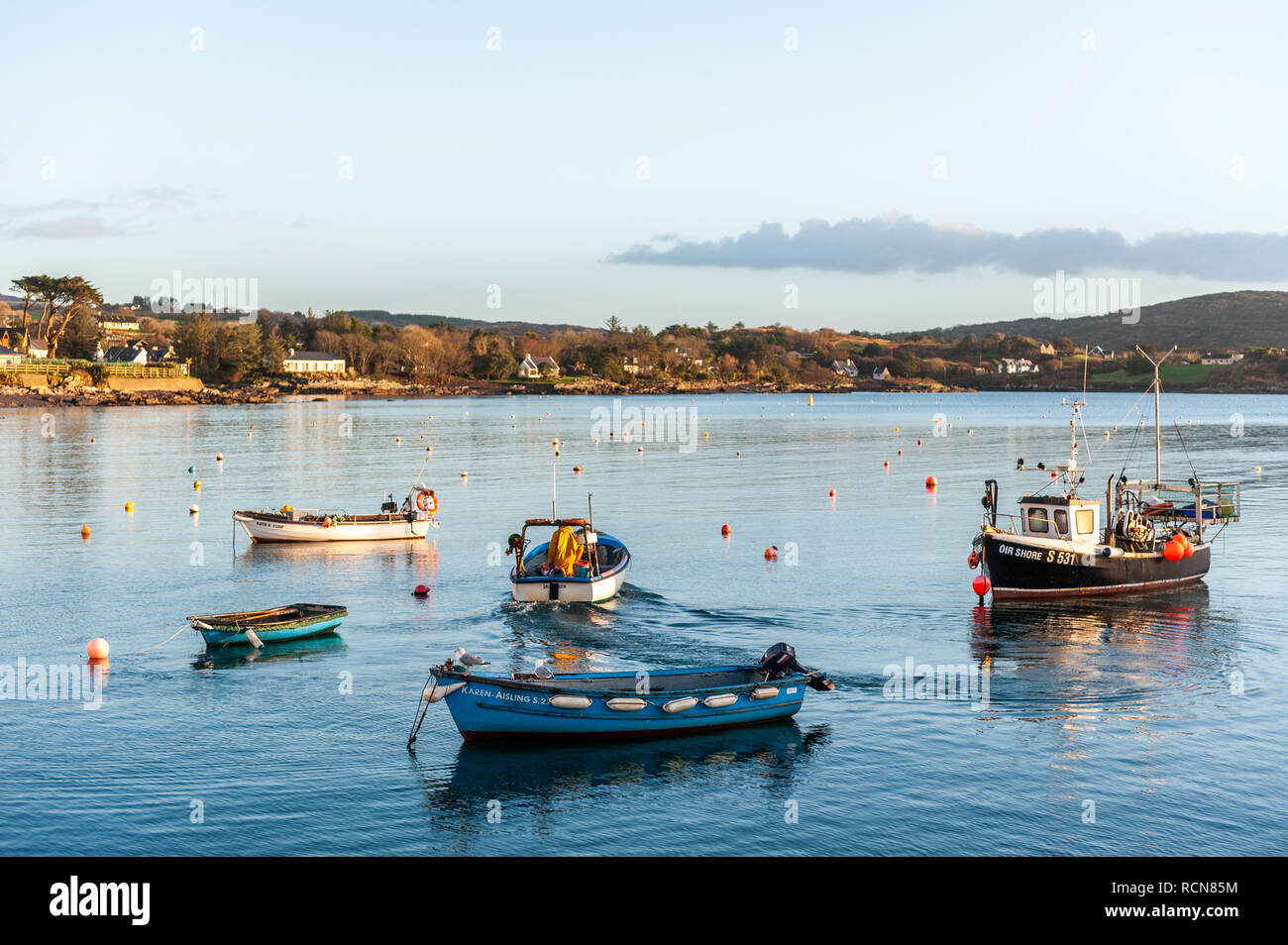 Schull, West Cork, Ireland. 16th Jan, 2019. A local fisherman sails away from Schull Harbour to haul his crab pots which have been soaking for a number of days. Met Eireann has put a yellow wind warning in place for counties Cork and Kerry from 12.00 to 17.00 today. Wind will reach mean speed between 50 to 65 km/h with gusts of up to 90km/h. Credit: AG News/Alamy Live News Stock Photo