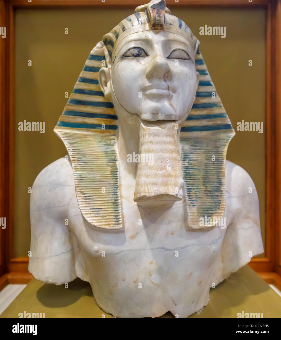 Exhibit in the Museum of Egyptian Antiquities (Cairo Museum), Cairo, Egypt: face and statue of 18th Dynasty New Kingdom King Thutmosis III Stock Photo