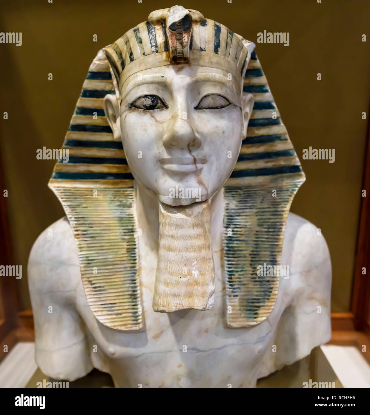 Exhibit in the Museum of Egyptian Antiquities (Cairo Museum), Cairo, Egypt: face and statue of 18th Dynasty New Kingdom King Thutmosis III Stock Photo