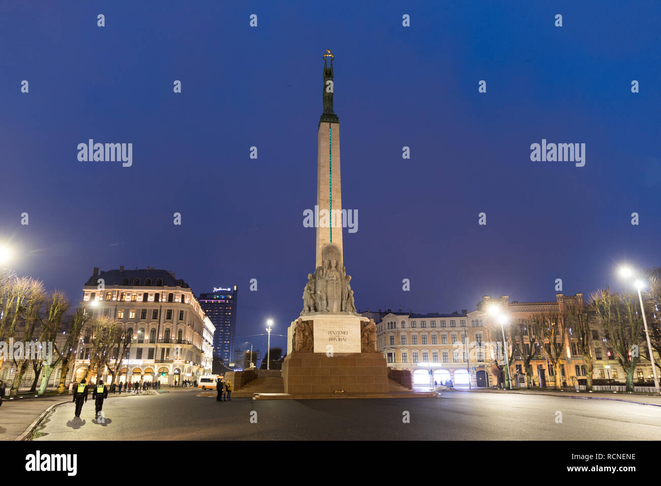 Freedom monument in Riga Latvia at night Stock Photo