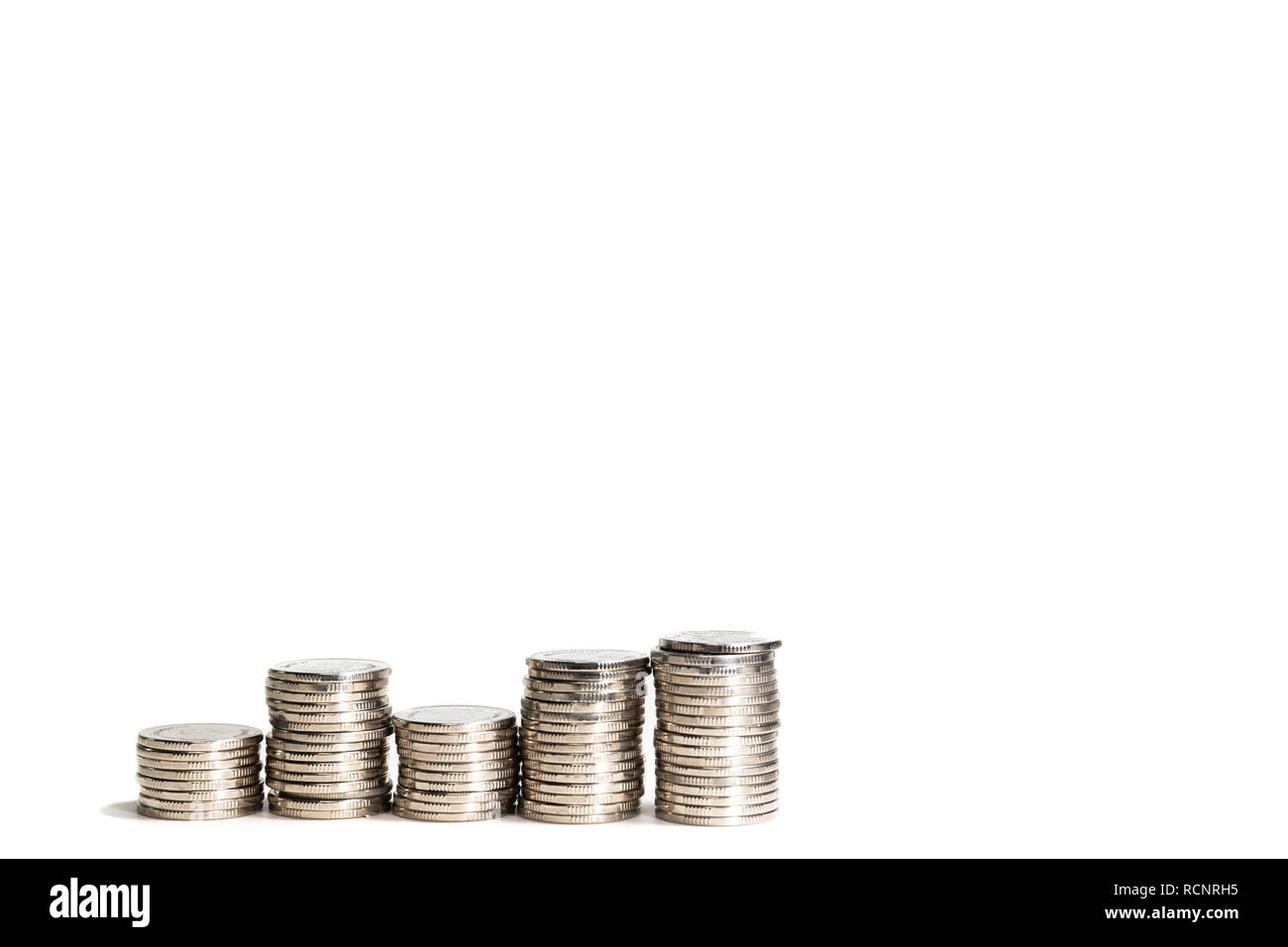 Pile of silver coins on white background Stock Photo - Alamy
