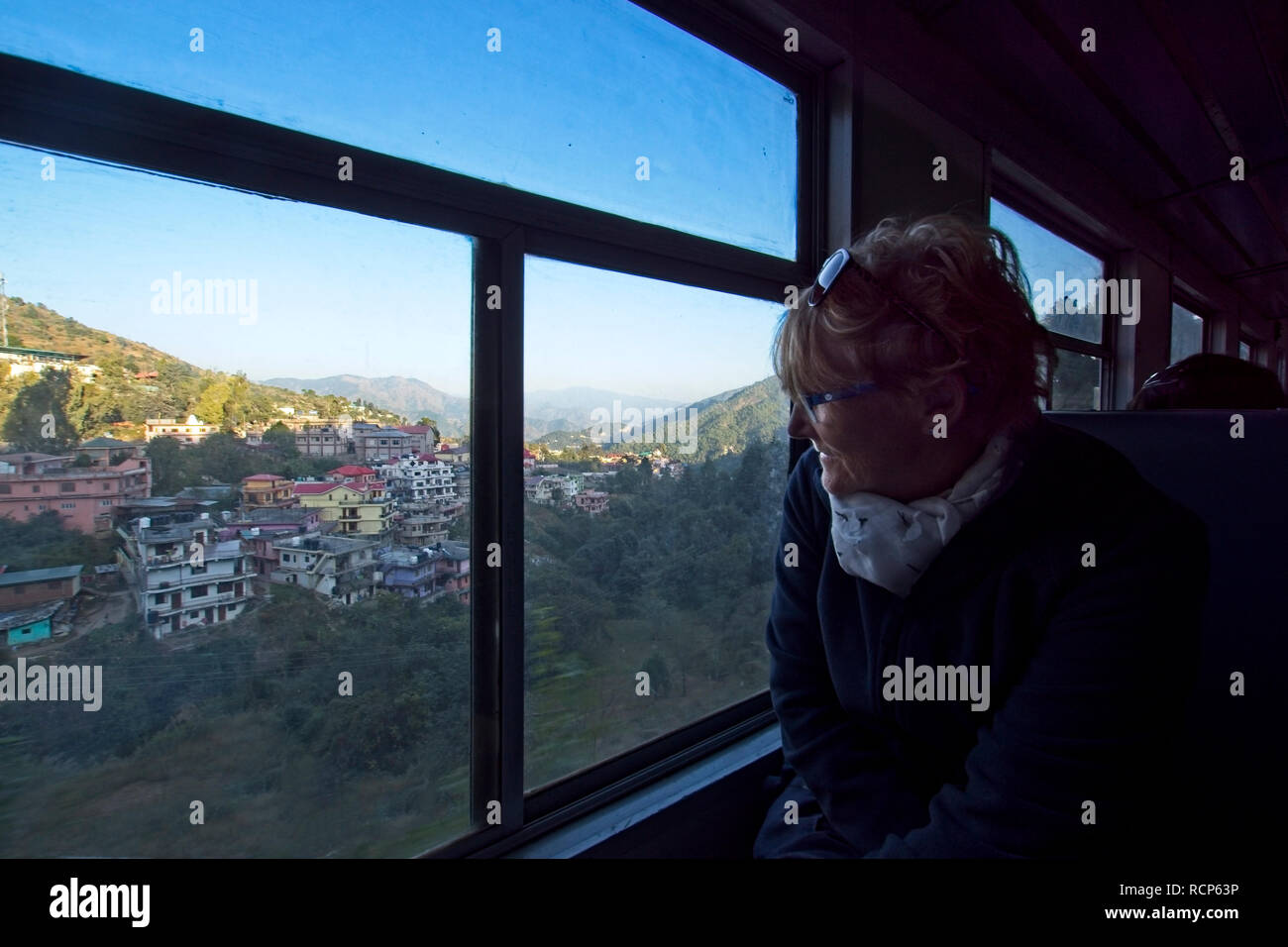 Shimla railway, Looking out at passing scenery Stock Photo