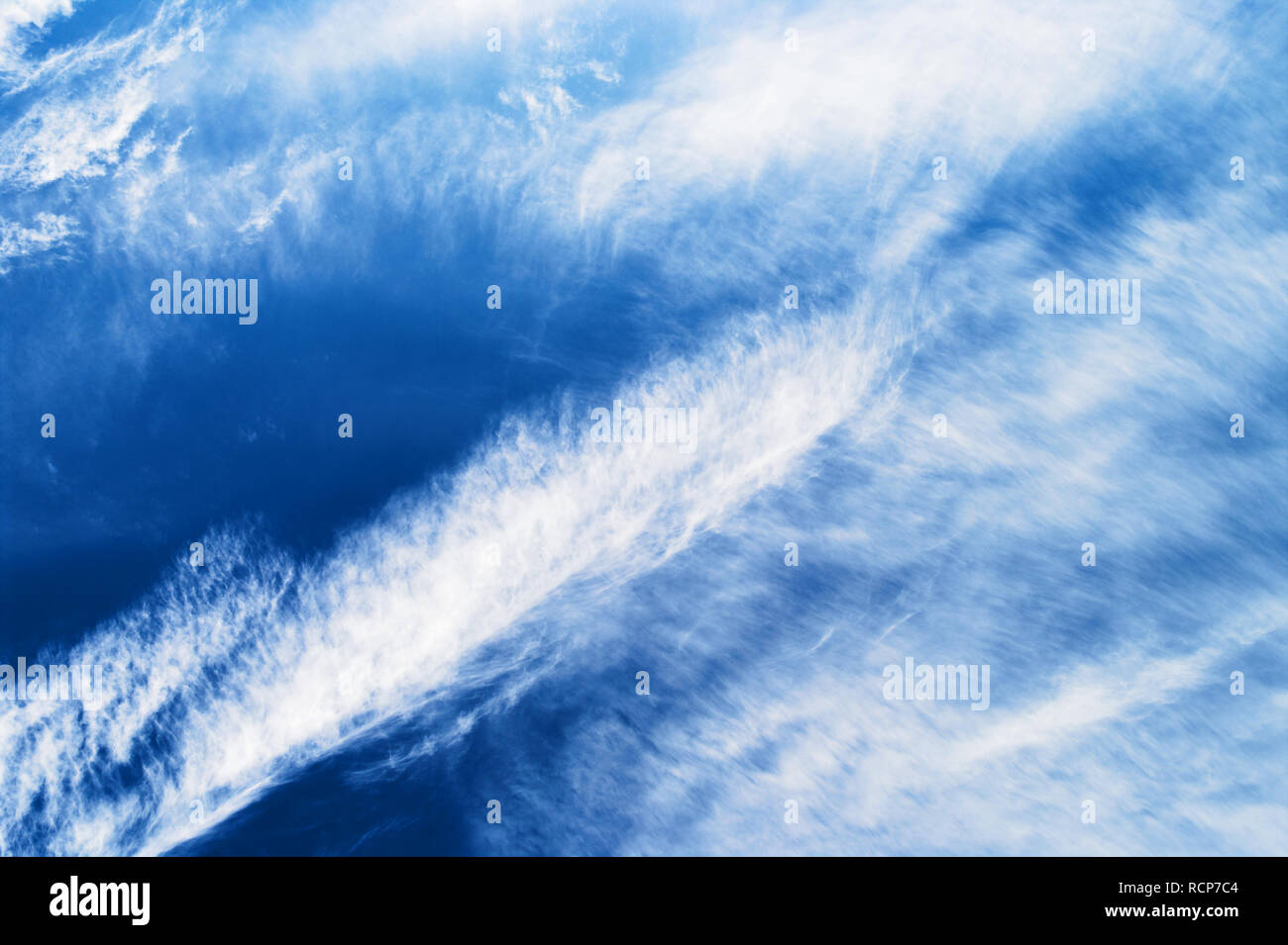 Cloudscape with with stratocumulus clouds on the blue sky. Stock Photo