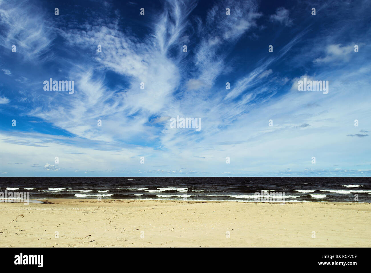 Landscape with stratocumulus clouds on the sky over the Baltic sea beach. Stegna, Pomerania, Poland. Stock Photo