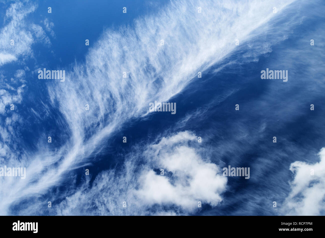 Cloudscape with with stratocumulus clouds on the blue sky. Stock Photo