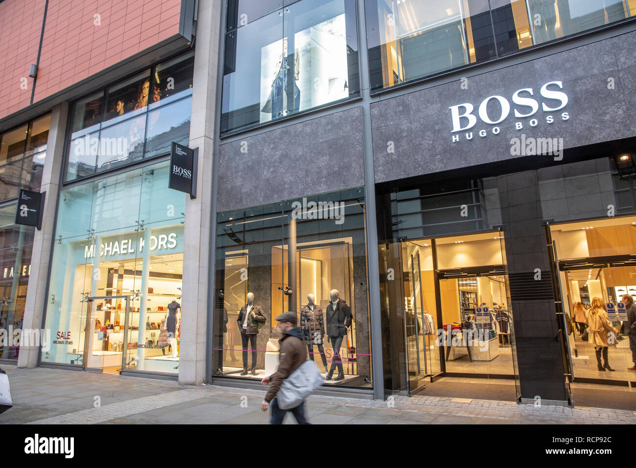 Hugo Boss and Michael Kors stores in Manchester city centre,England,Uk  Stock Photo - Alamy