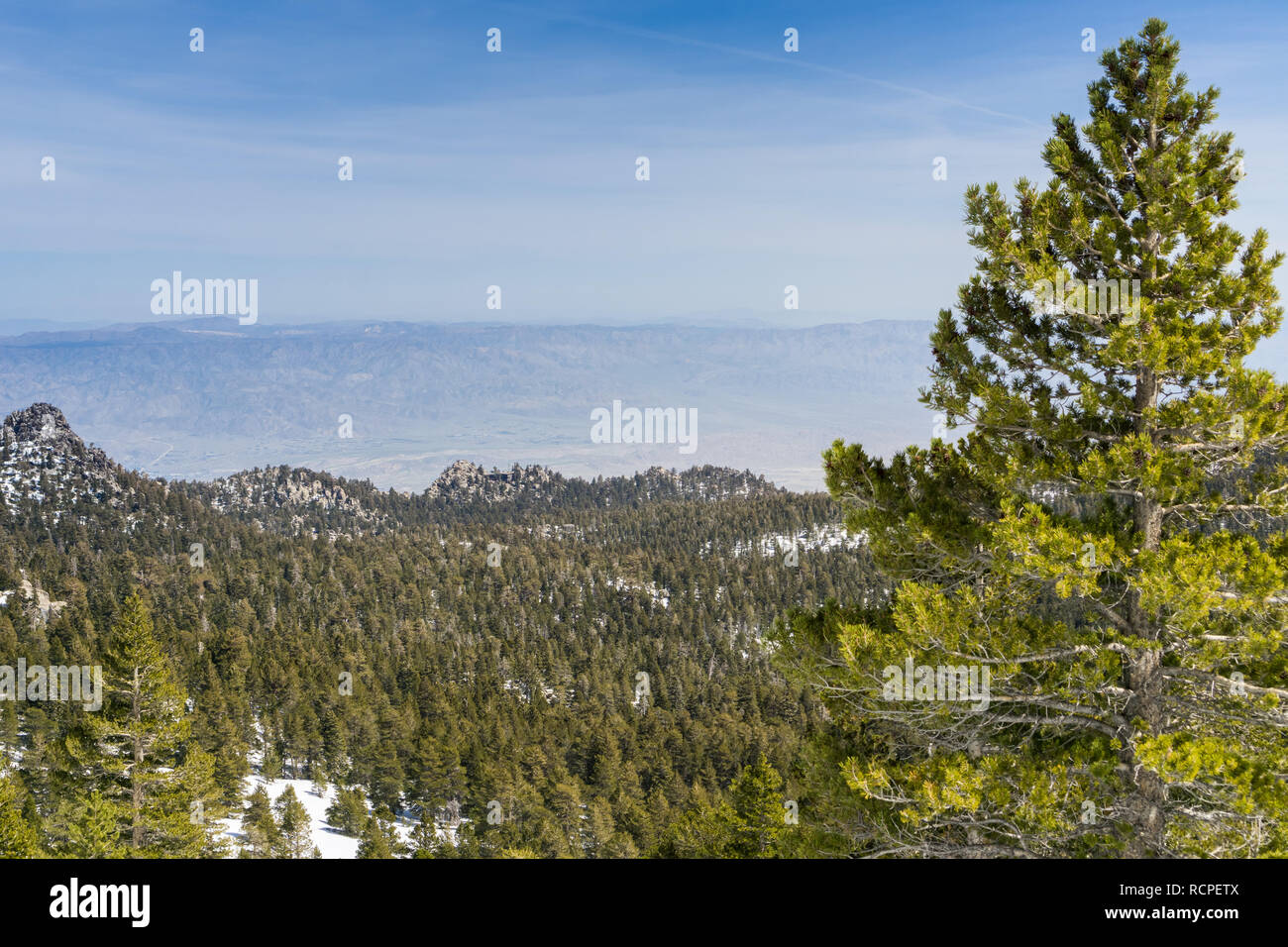View towards the Palm Springs Aerial Tramway on the ridge from the trail to Mount San Jacinto peak, California Stock Photo