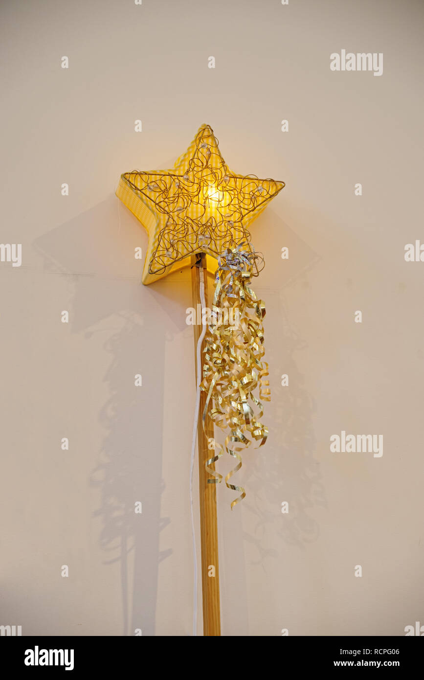 homemade lighted star on a pole for a Christmas Pageant Stock Photo