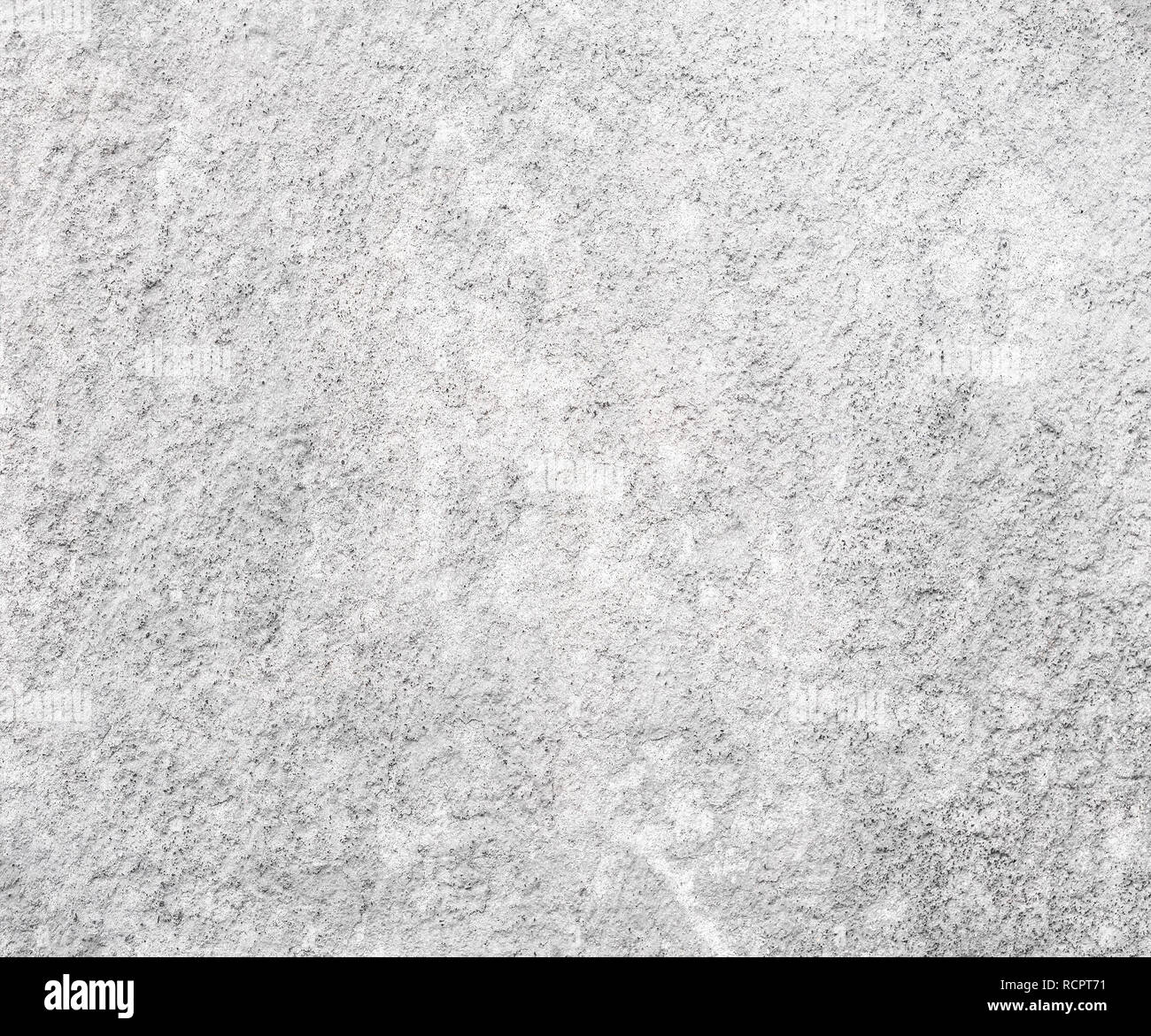 Background with white plaster wall with uneven surface Stock Photo