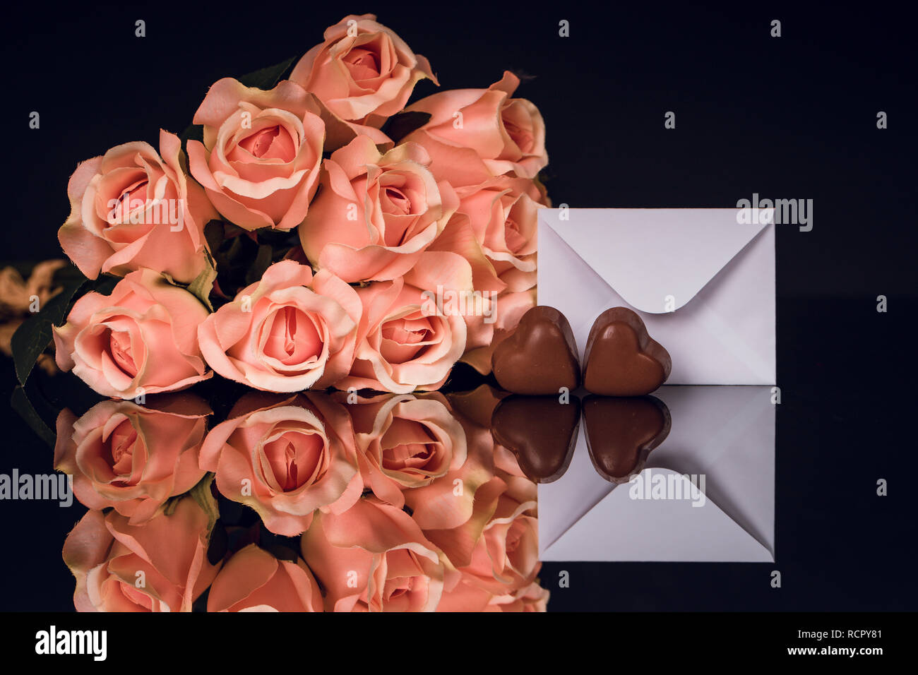 Valentines day greeting card with bouquet of roses and heart shaped ...
