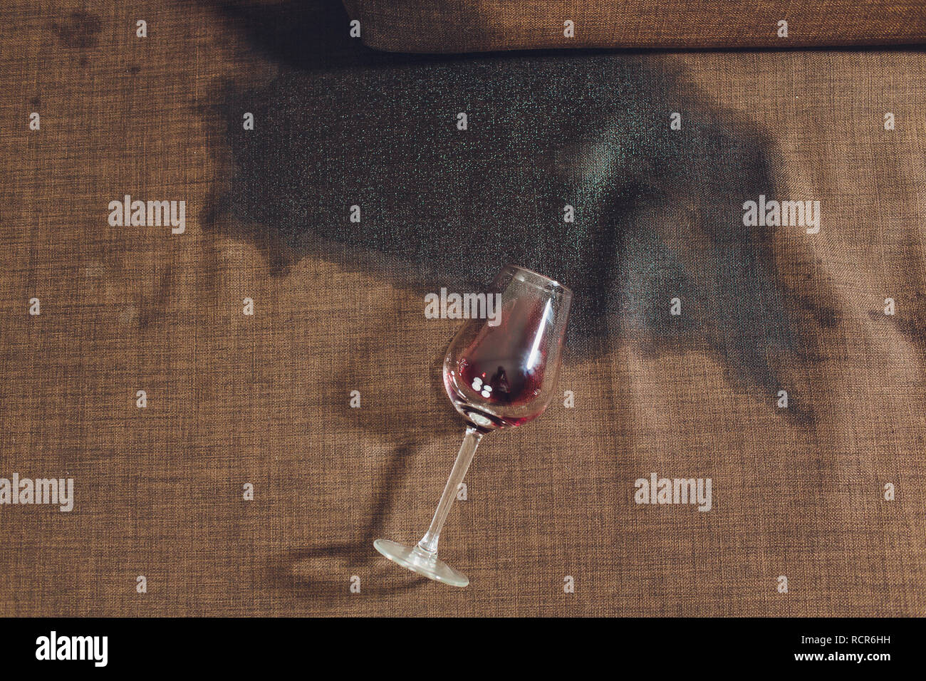 Red Wine Spilled On A Grey Couch Sofa Stock Photo 231620749 Alamy