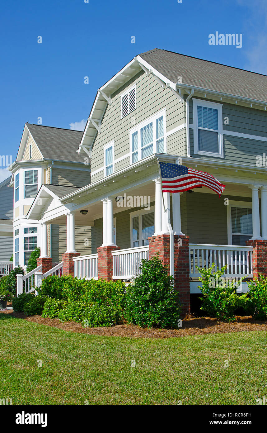Row of Homes Flying the American Flag Stock Photo
