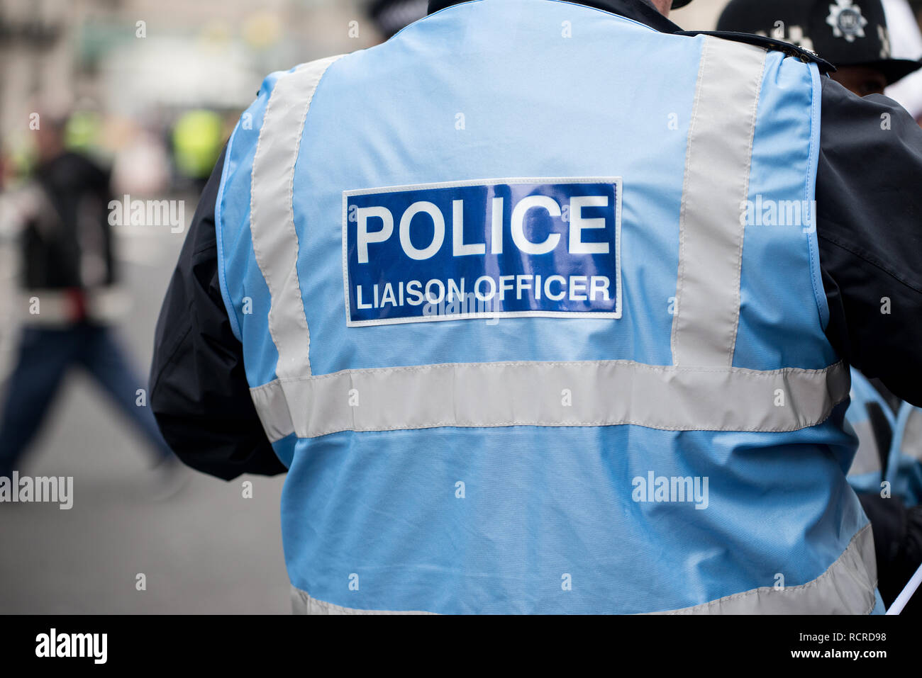 Police Liaison Officer watching over proceedings at the March Against Racism national demonstration, which started at Portland Place, London, UK. Stock Photo