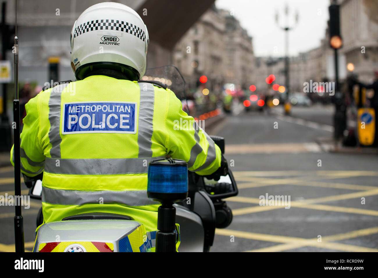 Police motorcycle riders, escort and clear the roads ahead of any traffic for a planned street demonstration through the streets of central London,UK. Stock Photo