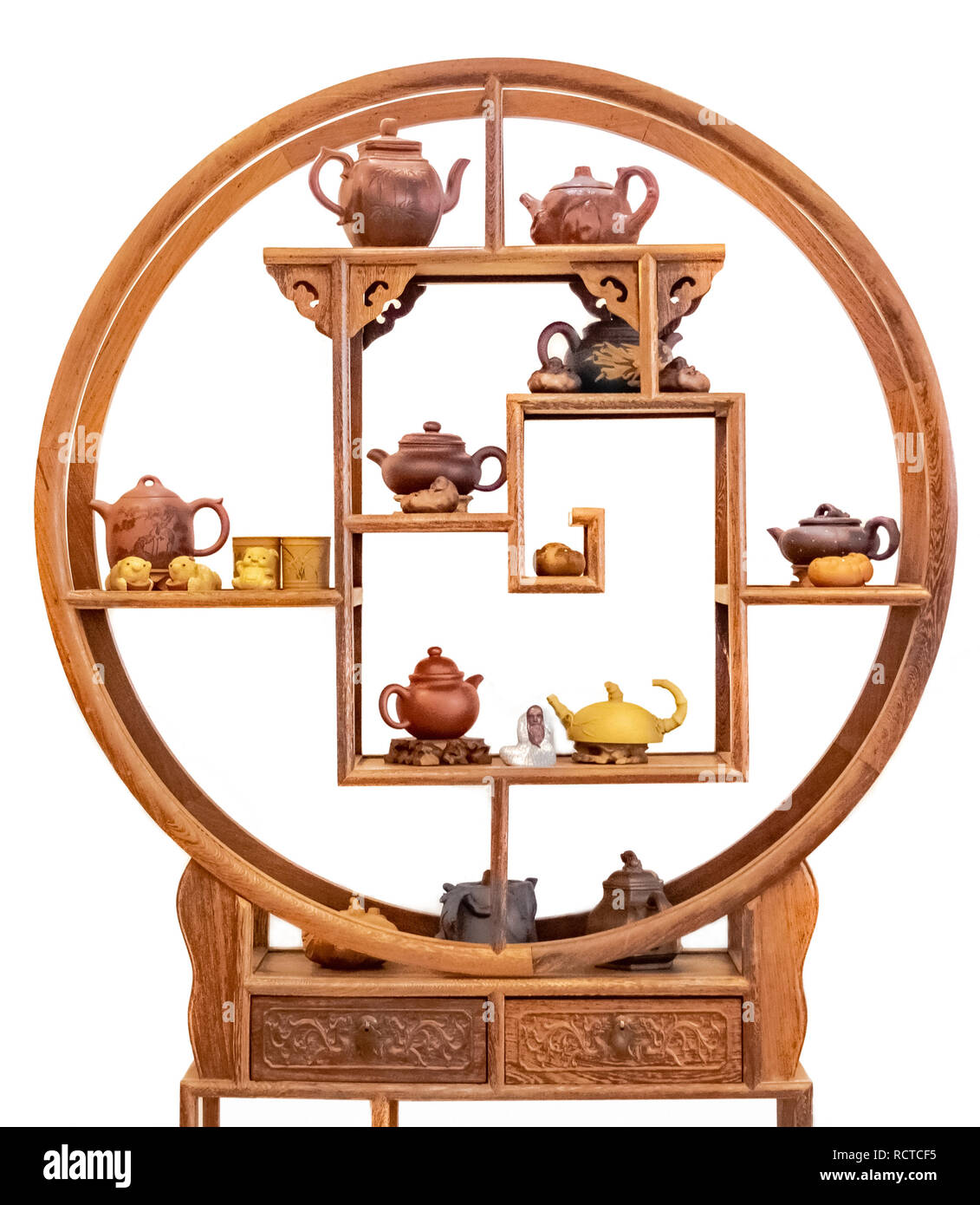 Teapots on a shelf Cut Out Stock Images & Pictures Alamy