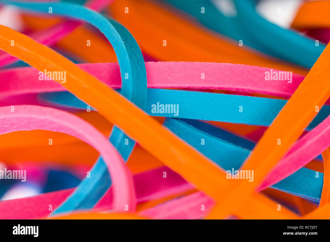 Closeup macro of multicolored rubber bands Stock Photo