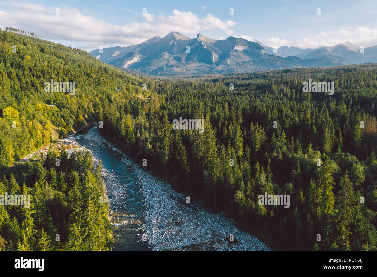 The Bialka river with Tatra mountains in the background Stock Photo